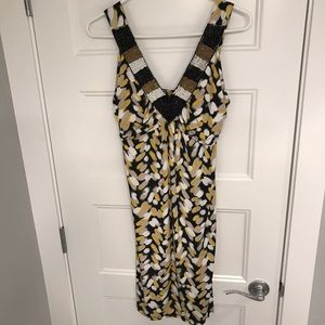 Gold, black, and white dress